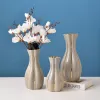 Wholesale of new Nordic light luxury ceramic electroplated vases, wedding soft furnishings, courtyard handicrafts, living room dining tables, home decorations and flower vases details Picture